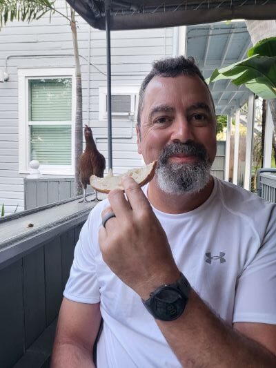 pic of Wes and a chicken